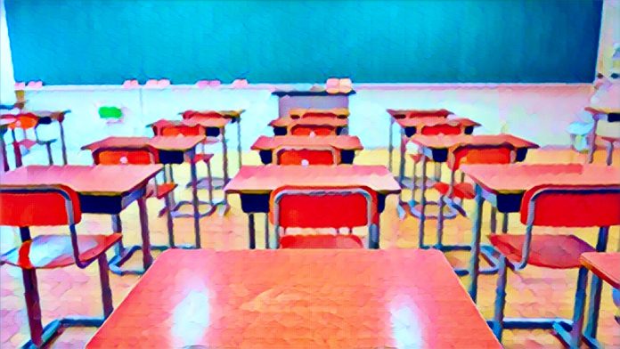 Nigerian classroom with students learning beyond textbooks.