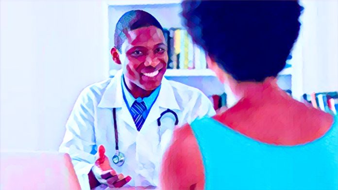 Health worker educating Nigerian community on disease prevention