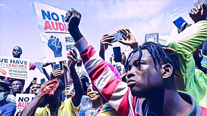 Nigerian youth protesting with placards during the End SARS movement