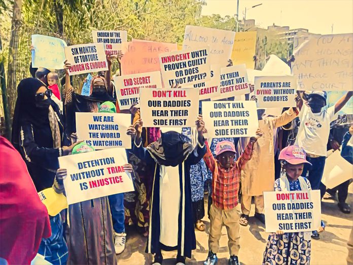 Detained Nigeria coup officers' families protest at NASS